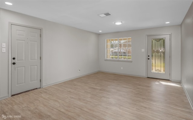 entrance foyer with recessed lighting, light wood-type flooring, visible vents, and baseboards