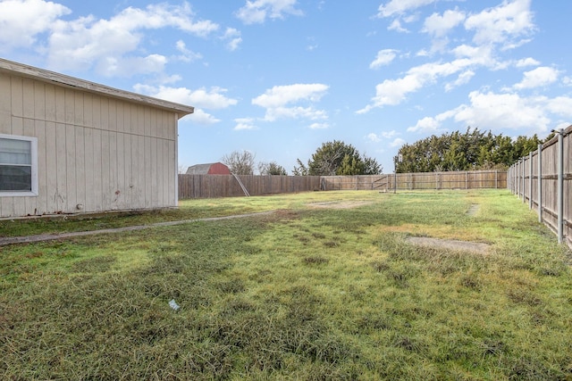 view of yard featuring a fenced backyard