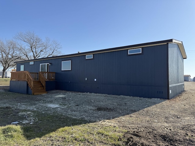 back of house featuring crawl space