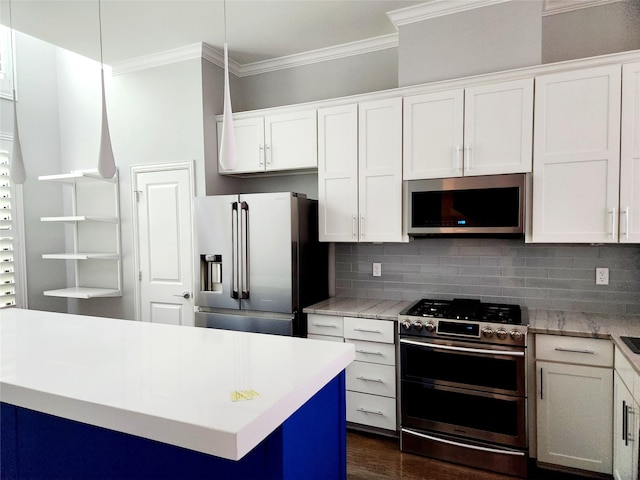 612 Skyline Bluff Dr, Fort Worth, TX 76102 - kitchen with stainless steel appliances, crown molding, tasteful backsplash, white cabinets, and light countertops