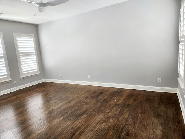 612 Skyline Bluff Dr, Fort Worth, TX 76102 - spare room with ceiling fan, dark wood-style flooring, and baseboards