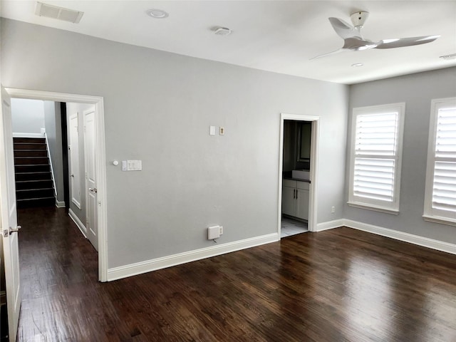 612 Skyline Bluff Dr, Fort Worth, TX 76102 - unfurnished room with dark wood finished floors, ceiling fan, baseboards, stairs, and a smoke detector