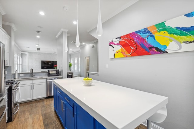 612 Skyline Bluff Dr, Fort Worth, TX 76102 - kitchen featuring stainless steel appliances, a sink, blue cabinets, white cabinetry, and dark wood-type flooring