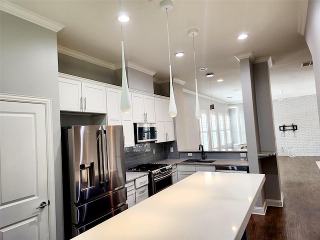 612 Skyline Bluff Dr, Fort Worth, TX 76102 - kitchen with appliances with stainless steel finishes, a sink, backsplash, white cabinets, and crown molding