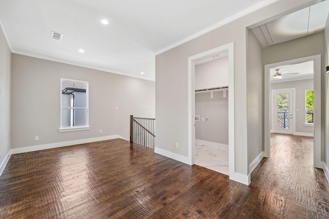 unfurnished bedroom featuring recessed lighting, wood finished floors, visible vents, baseboards, and attic access