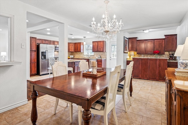 dining area with recessed lighting and baseboards