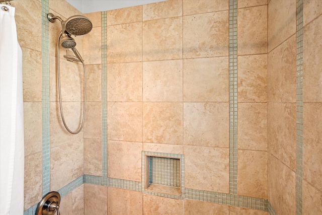 room details with a tile shower