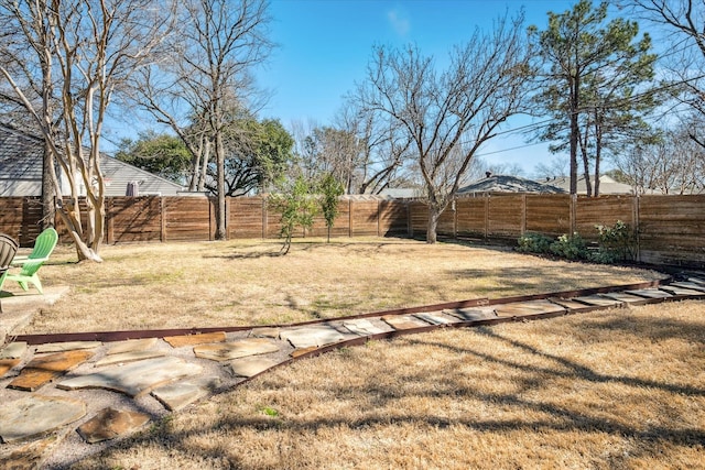 view of yard featuring a fenced backyard