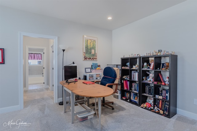 carpeted office with recessed lighting and baseboards