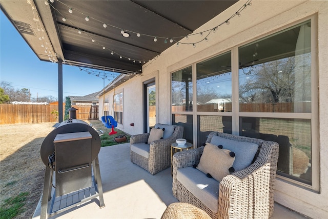 view of patio / terrace with a fenced backyard and an outdoor hangout area