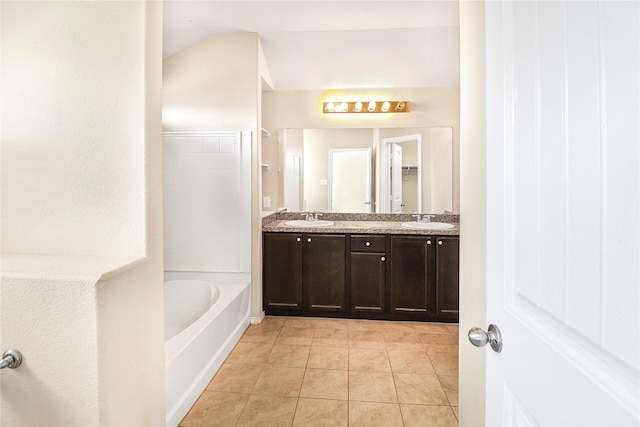 302 Triple Crown Ln, Ponder, TX 76259 - full bath featuring double vanity, tile patterned flooring, a bathing tub, and a sink