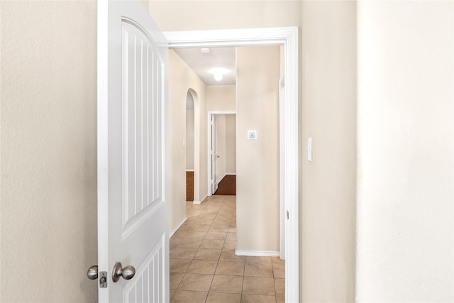302 Triple Crown Ln, Ponder, TX 76259 - hall featuring light tile patterned floors and arched walkways