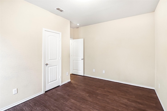 302 Triple Crown Ln, Ponder, TX 76259 - unfurnished room featuring visible vents, baseboards, and wood finished floors