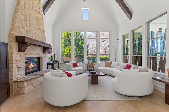 living area featuring high vaulted ceiling, beam ceiling, light tile patterned flooring, and a fireplace