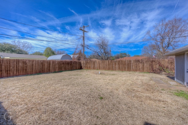 view of yard with fence