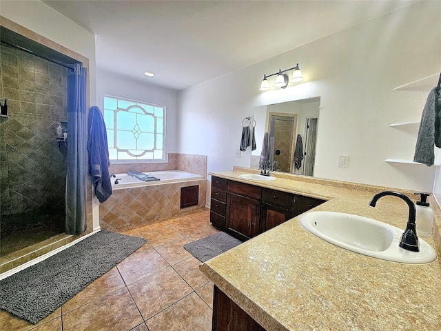 full bath with a garden tub, visible vents, a stall shower, vanity, and tile patterned floors