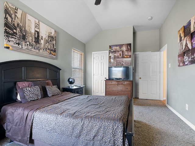 bedroom featuring carpet, lofted ceiling, a closet, ceiling fan, and baseboards