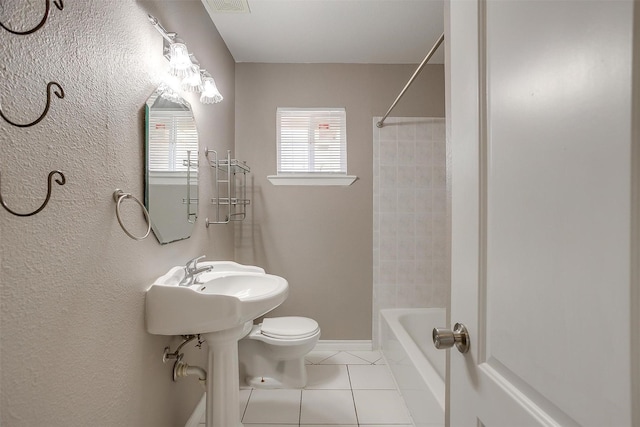 2013 Proctor Dr, Grand Prairie, TX 75051 - full bath featuring tile patterned floors and tub / shower combination