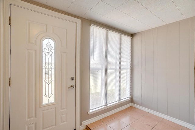 2013 Proctor Dr, Grand Prairie, TX 75051 - foyer with baseboards and light tile patterned floors
