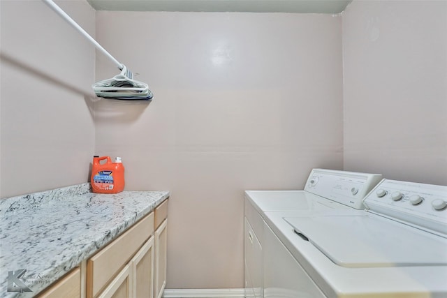 laundry area featuring washing machine and clothes dryer