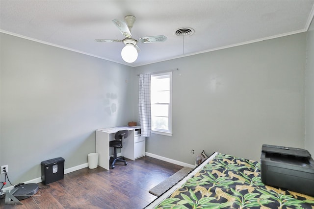 bedroom with baseboards, visible vents, dark wood finished floors, and ornamental molding