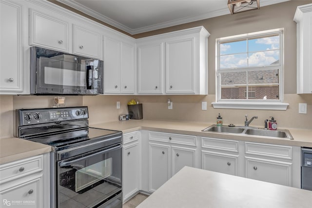 kitchen with a sink, white cabinets, light countertops, black appliances, and crown molding