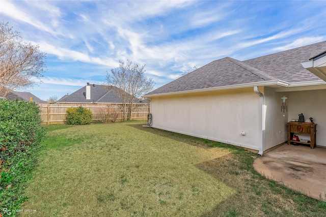 view of yard with fence