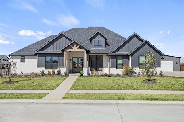 1024 Todd St, Caddo Mills, TX 75135 - modern farmhouse with a shingled roof, a front yard, french doors, and brick siding