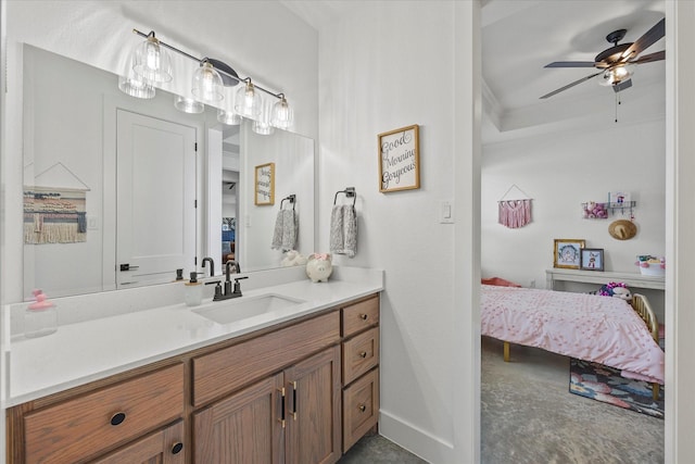 1024 Todd St, Caddo Mills, TX 75135 - bathroom with baseboards, ceiling fan, vanity, and ensuite bath