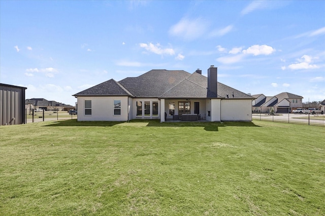 1024 Todd St, Caddo Mills, TX 75135 - back of house with a chimney, fence, a lawn, and roof with shingles