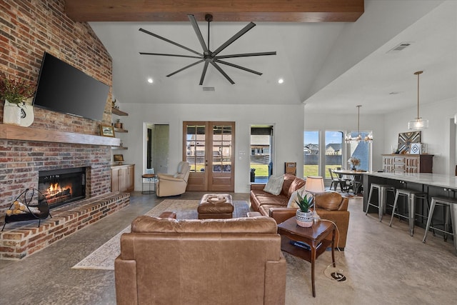 1024 Todd St, Caddo Mills, TX 75135 - living area with high vaulted ceiling, visible vents, french doors, a brick fireplace, and beamed ceiling