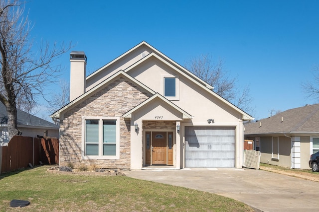 view of front of house with a garage, fence, concrete driveway, a chimney, and a front yard