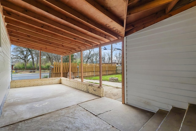 unfurnished sunroom featuring plenty of natural light