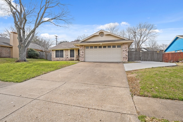 ranch-style home with brick siding, an attached garage, fence, driveway, and a front lawn