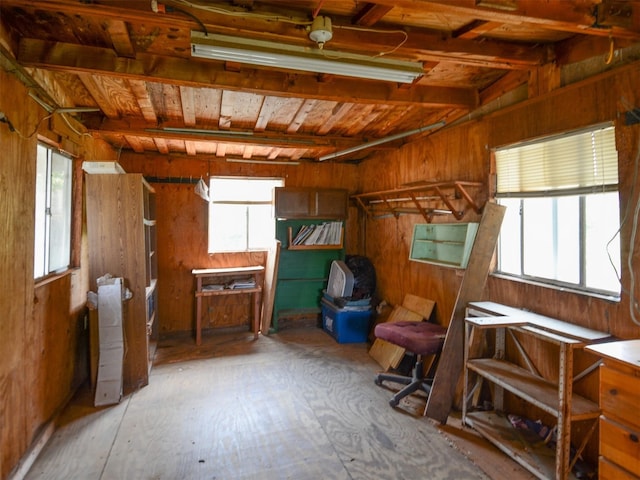 interior space featuring wooden walls