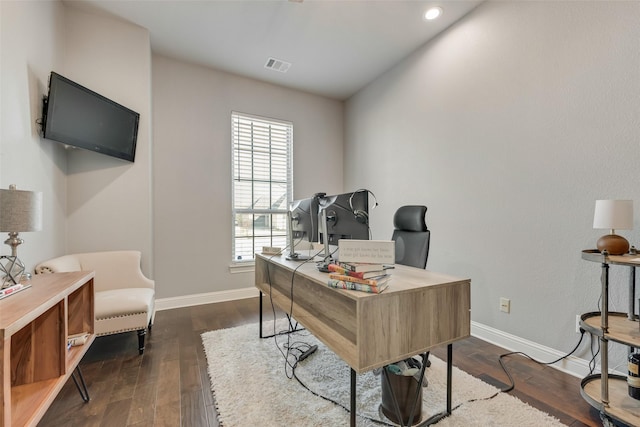 office area featuring dark wood-style flooring, recessed lighting, visible vents, and baseboards