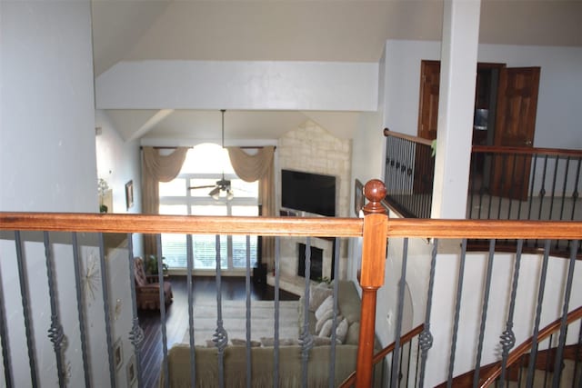 staircase with lofted ceiling