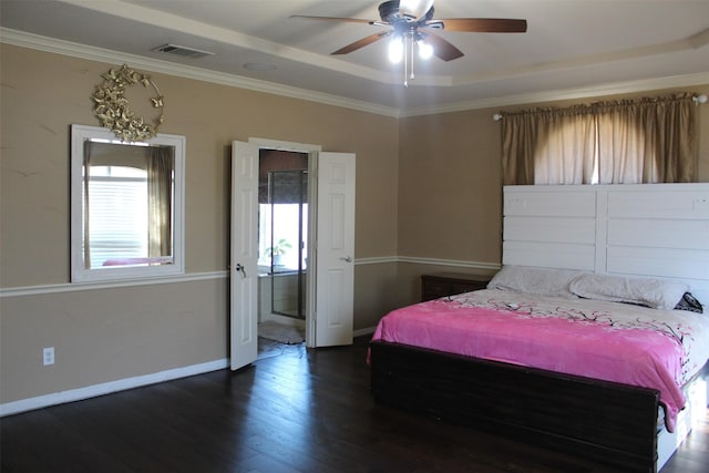 bedroom featuring visible vents, ornamental molding, ceiling fan, wood finished floors, and baseboards