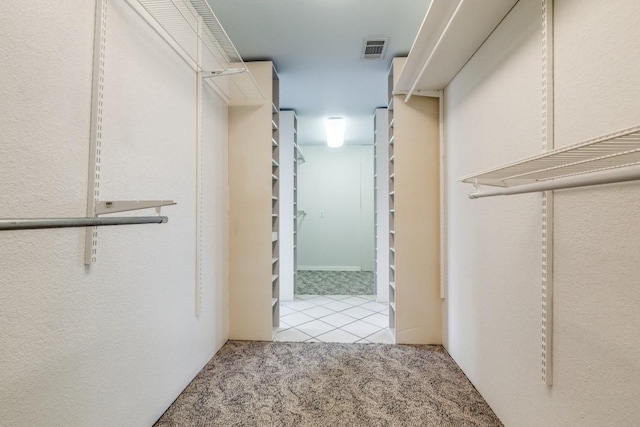 11484 Moran Rd, Azle, TX 76020 - walk in closet with tile patterned floors and carpet floors