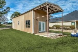 view of outdoor structure featuring french doors