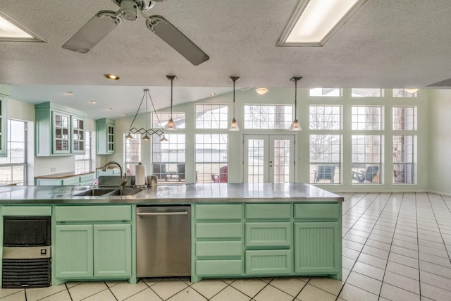 11484 Moran Rd, Azle, TX 76020 - kitchen with dishwasher, a sink, green cabinets, open floor plan, and a textured ceiling