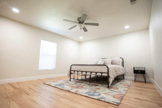 1606 Denver Ave, Fort Worth, TX 76164 - bedroom featuring wood finished floors, recessed lighting, baseboards, and ceiling fan