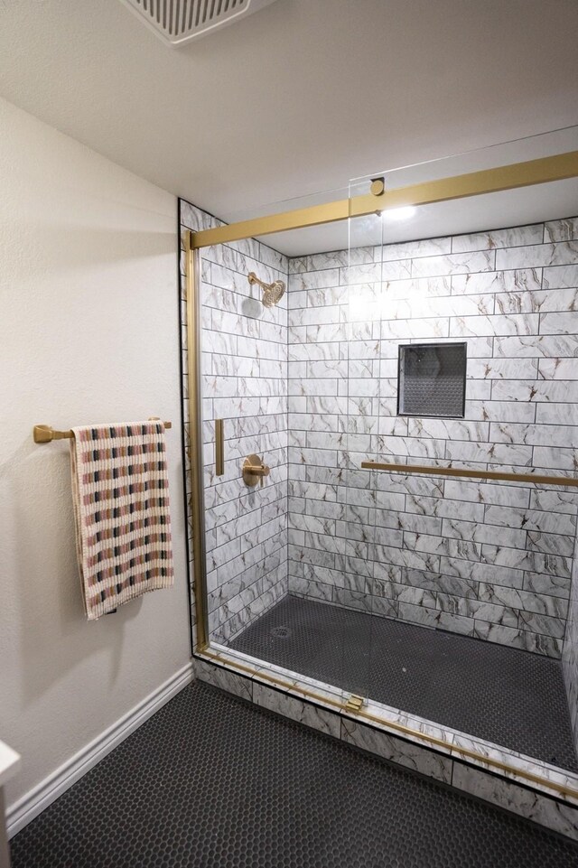 1606 Denver Ave, Fort Worth, TX 76164 - full bath with a shower stall and baseboards