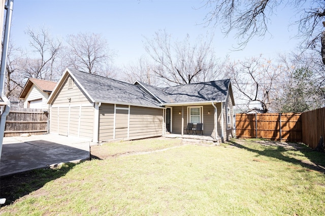1606 Denver Ave, Fort Worth, TX 76164 - back of house featuring a porch and roof with shingles