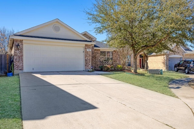 ranch-style home with a garage, a front lawn, concrete driveway, and brick siding