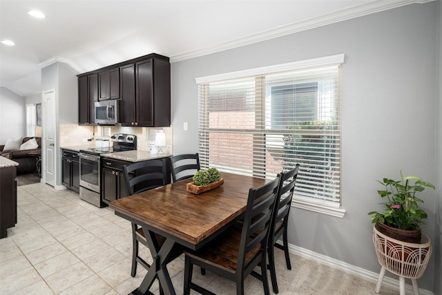 dining room with ornamental molding, light tile patterned flooring, recessed lighting, and baseboards