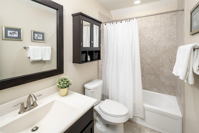 full bath with vanity, tile patterned flooring, toilet, and shower / bathtub combination with curtain