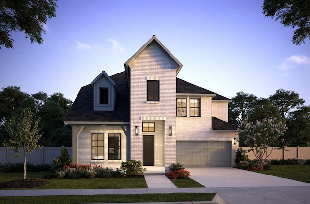 view of front facade featuring brick siding, fence, driveway, and an attached garage