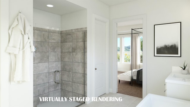 ensuite bathroom with recessed lighting, a stall shower, ensuite bath, and vanity