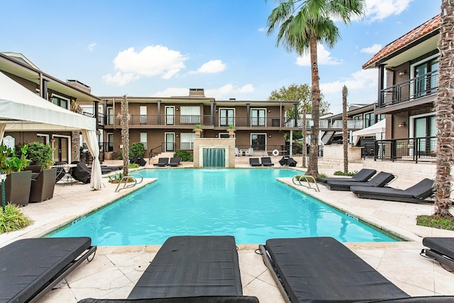 community pool featuring a patio